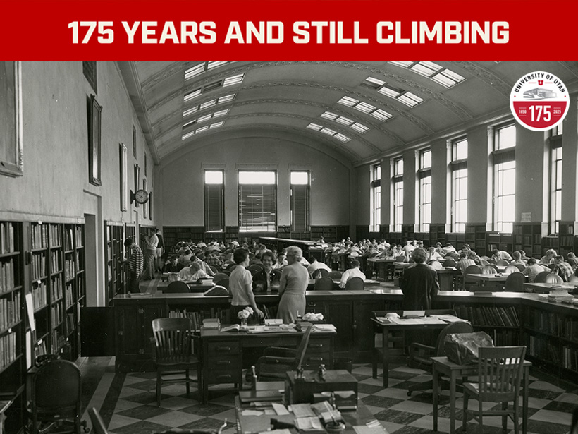 A vintage photo from the Thomas building of students studying in the library.
