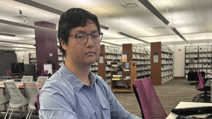 Gojo Zhang sitting in Protospace