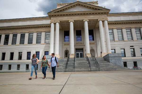 students walking in front of building on Presidents Circle