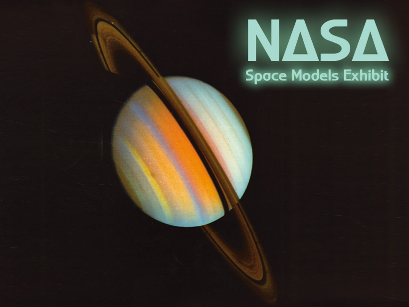 photo of saturn with nasa space models exhibit text next to it