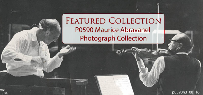 A black-and-white photograph of conductor Maurice Abravanel gesturing to Jack Benny, a violinist, taken in the 1970s. The text reads “Featured Collection: P0590 Maurice Abravanel Photograph Collection” 