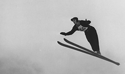 Jumping skiier featured in the Ski Archive Exhibit